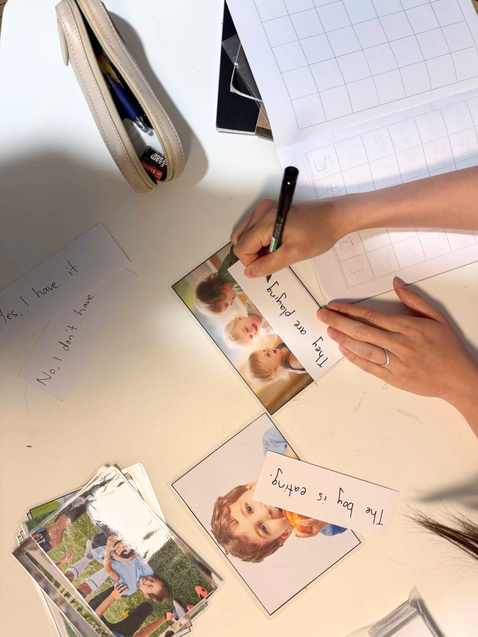 Child learning with flashcards and activities
